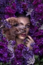 Beautiful woman with alpaca in flowers background beauty portrait photoshoot