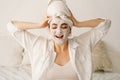 Beautiful woman applying facial mask Royalty Free Stock Photo