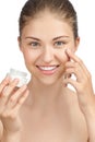 Beautiful woman applying moisturizer cream Royalty Free Stock Photo