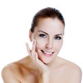 Beautiful woman applying moisturizer cream Royalty Free Stock Photo