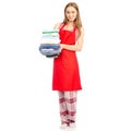 Beautiful woman in apron stack towels ironed clean clothes in hand Royalty Free Stock Photo