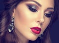 Beautiful woman with arabic make-up, red lips and curls. Beauty face. Insta Color