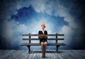 Beautiful woman architect sitting on wooden bench Royalty Free Stock Photo