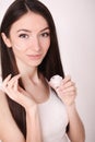 A beautiful woman asia using a skin care product, moisturizer or Royalty Free Stock Photo