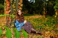 Beautiful woman. Autumn stylish outfit. Adorable lady enjoy sunny autumn day