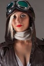 Beautiful woman in aviator helmet