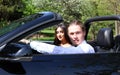 Beautiful woman in back prom dress and handsome guy in suit, teenager ready for a luxury night. Royalty Free Stock Photo