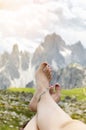 Beautiful woman barefooted legs on a natural wooden background Fashion background. Cropped image of pretty young woman legs Royalty Free Stock Photo