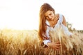 Beautiful woman and barley fields Royalty Free Stock Photo