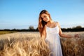 Beautiful woman and barley fields Royalty Free Stock Photo