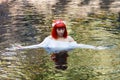 Beautiful woman bathing in a beautiful river Royalty Free Stock Photo