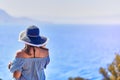 Beautiful woman in beach hat enjoying sea view with blue sky at sunny day in Bodrum, Turkey. Vacation Outdoors Seascape Summer Royalty Free Stock Photo