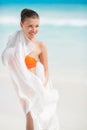 Beautiful woman on the beach in orange bikini Royalty Free Stock Photo