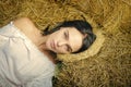 Beautiful woman. Beauty woman relax on hay grass Royalty Free Stock Photo