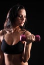 Beautiful woman bicep curl exercise in gym