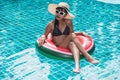 Beautiful woman bikini in inflatable watermelon Royalty Free Stock Photo