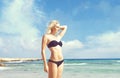 Beautiful woman in black bikini. Young and sporty girl posing on Royalty Free Stock Photo