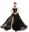 Beautiful Woman In Black Evening Gown Looking Down, Full Length Vintage Fashion Flying Chiffon Dress Over White