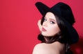 Beautiful woman in black hat. Sensual retro fashion. Isolated. High-fashion portrait. Royalty Free Stock Photo