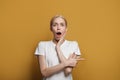 Beautiful woman blonde female model screaming with open mouth. Expressive facial expressions Royalty Free Stock Photo