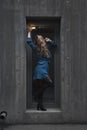 Beautiful woman with blonde long hair and blue eyes wanders the streets of Istanbul and poses for the camera