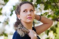 Beautiful woman among blossoming trees Royalty Free Stock Photo