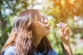 A beautiful woman blowing bubbles Royalty Free Stock Photo