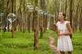 Beautiful woman blowing bubbles Royalty Free Stock Photo