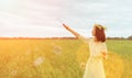 Beautiful woman blowing soap bubbles in summer outdoor Royalty Free Stock Photo