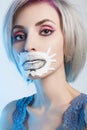 Woman with blue hair and sticker on her face Royalty Free Stock Photo