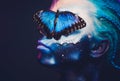 Beautiful woman with blue hair and butterfly Royalty Free Stock Photo