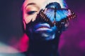 Beautiful woman with blue hair and butterfly Royalty Free Stock Photo