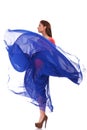 Beautiful woman in blue waving flying dress Royalty Free Stock Photo