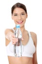 Beautiful woman with bottle of mineral water Royalty Free Stock Photo