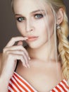 Beautiful woman with braided hair, make up and manicure Royalty Free Stock Photo