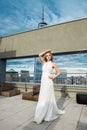Beautiful woman bride in long white wedding dress