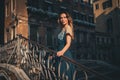 Beautiful woman on a bridge in Venice, Italy Royalty Free Stock Photo