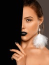Beautiful woman with bright makeup and black lipstick on her lips, in the Gothic style. Makeup and cosmetology concept Royalty Free Stock Photo