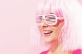 Beautiful woman in a bright pink wig Royalty Free Stock Photo