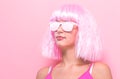 Beautiful woman in a bright pink wig Royalty Free Stock Photo