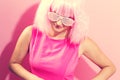 Beautiful woman in a bright pink wig Royalty Free Stock Photo