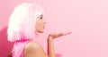 Beautiful woman in a bright pink wig Royalty Free Stock Photo