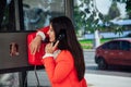 Beautiful asian woman brunette talking on the street phone Royalty Free Stock Photo