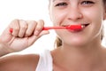 Beautiful woman brushing teeth, happy face