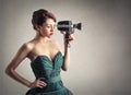 Beautiful woman with a camera Royalty Free Stock Photo