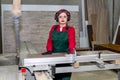 Beautiful woman carpenter beginning job in carpentry Royalty Free Stock Photo