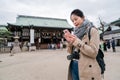 Woman chatting with her friend by cellphone Royalty Free Stock Photo