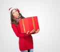 Beautiful woman carrying a large present