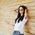 Beautiful woman in casual clothes wearing sunglasses