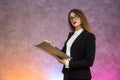 Beautiful woman with clipboard offering sign a contract with pen Royalty Free Stock Photo